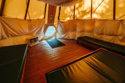 an inside view of a tent with a laptop in it at Sundance By Basecamp in Kananaskis Village