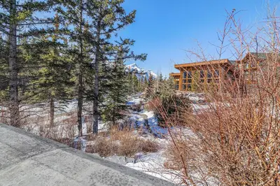 a skateboard ramp in the snow in front of a building at 3 Bedroom Condo by Canadian Rockies Vacation Rentals in Canmore