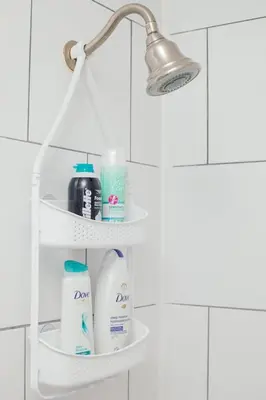 a bathroom rack with toiletries and a light at Cozy 3 Bedroom Contemporary Home With Free Parking in Edmonton