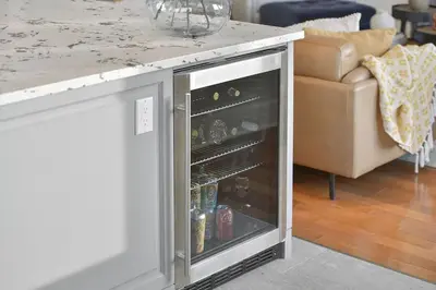 a kitchen island with an open oven in a living room at Mount Finlayson View Villa by EMR Vacation Rentals in Victoria