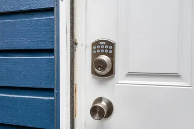 a blue door with a silver door knob at Luxury Delta 2BD Suit on ground floor in Delta