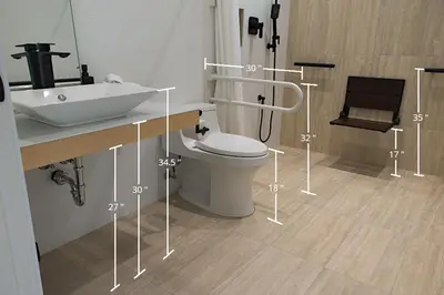 a bathroom with a white toilet and a sink at The Shed at Moon Dance in Madeira Park
