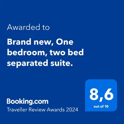 a screenshot of a phone with the words upgraded to brand new one bed room at Dugg Bed And Breakfast in Victoria
