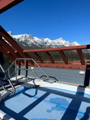 a view of the mountains from the deck of a boat at Wanna get away in the Rocky Mountains in Canmore