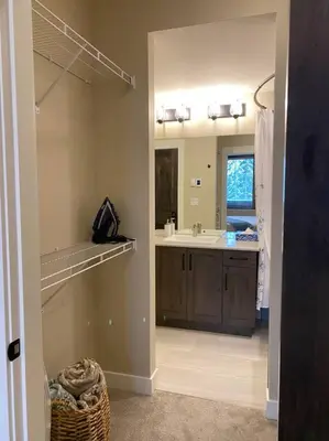a kitchen with a sink and a counter top at Cozy Modern Ski-in & Ski-out, Hot Tub, Townhouse in Sun Peaks